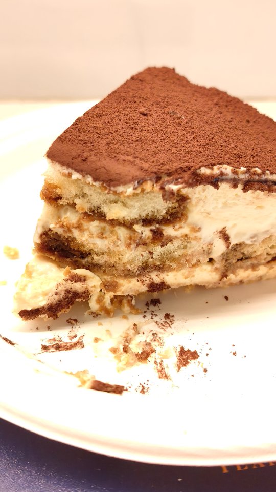 Episode 1 of my Christmas Series: Tiramisu Cheesecake.

Follow@bakingwithrona for more easy and fun #christmasrecipes

This one looks and feels a lot like love. If you can't choose between cheesecake and Tiramisu you shouldn't have to. 

You will need
About 30 ladyfinger biscuits 
1 1/2 cups hot water mixed with 2 tbsp instant coffee powder 

For the biscuit crumb layer mix
300 gms digestive biscuits powdered 
100 gms butter melted 

For the cheesecake layer mix 
400 gms cream cheese 
1/2 cup sugar
1/2 tsp vanilla extract 
2 cups whipped cream 

For the Tiramisu layer mix
200 gms mascarpone cheese 
1/4 cup sugar 
1 cup whipped cream 

1 1/2 tbsp cocoa powder to dust the top 

* In a springform pan, first spread the biscuit layer evenly with the back of a spoon
* Then spread half the cream cheese mixture
* Take half the biscuits, dip each in coffee briefly and place in a layer over the cream cheese mixture. Don't soak for too long, the biscuit will crumble and the coffee will leak in the pan
*Spread the mascarpone mixture over the biscuits followed by another layer of biscuits dipped in coffee and then the remaining cream cheese mixture
* Leave to set in the fridge for atleast 4 hours or overnight is best
* When set, release the springform pan, dust the top of the cheesecake with cocoa powder and serve
